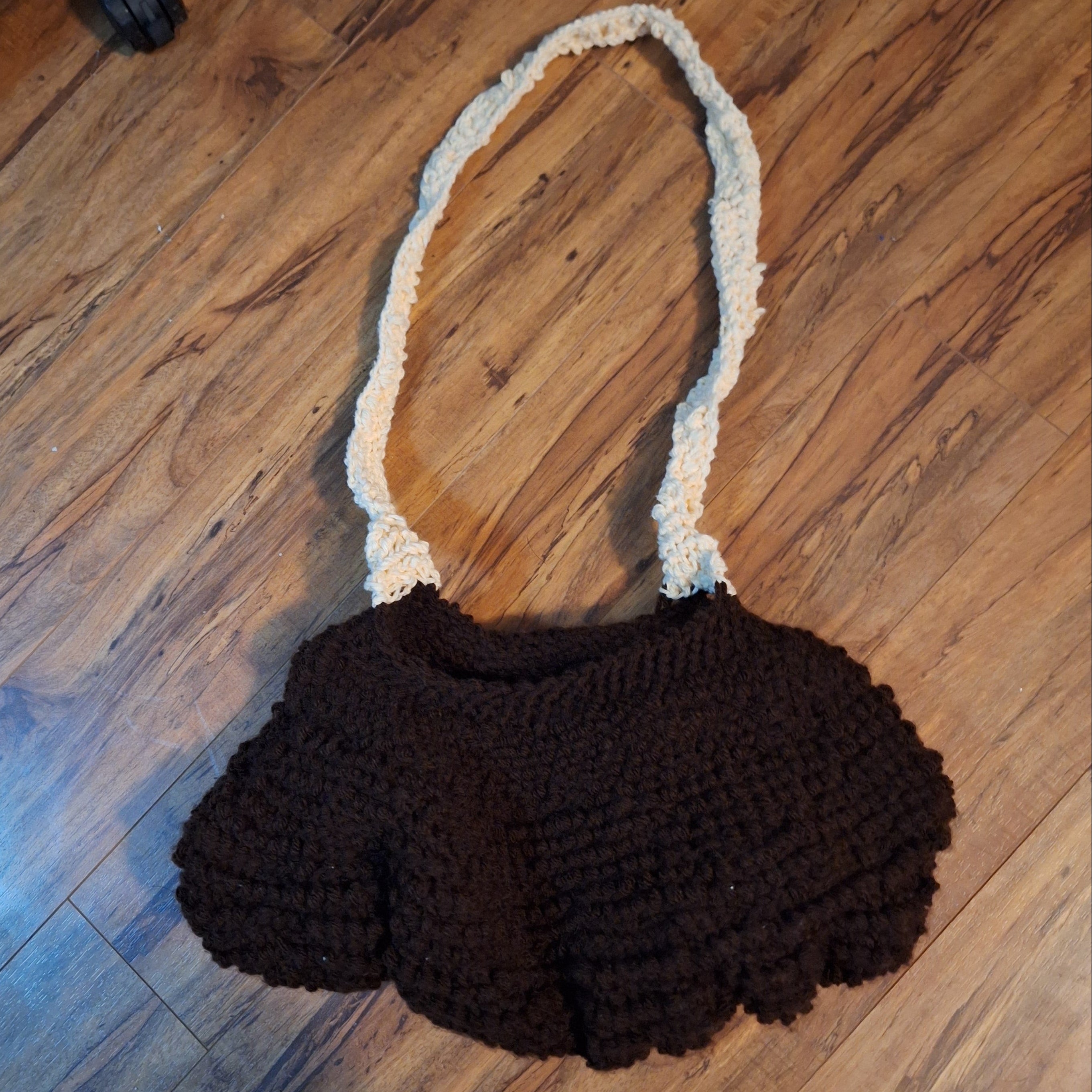 brown clamshell purse
