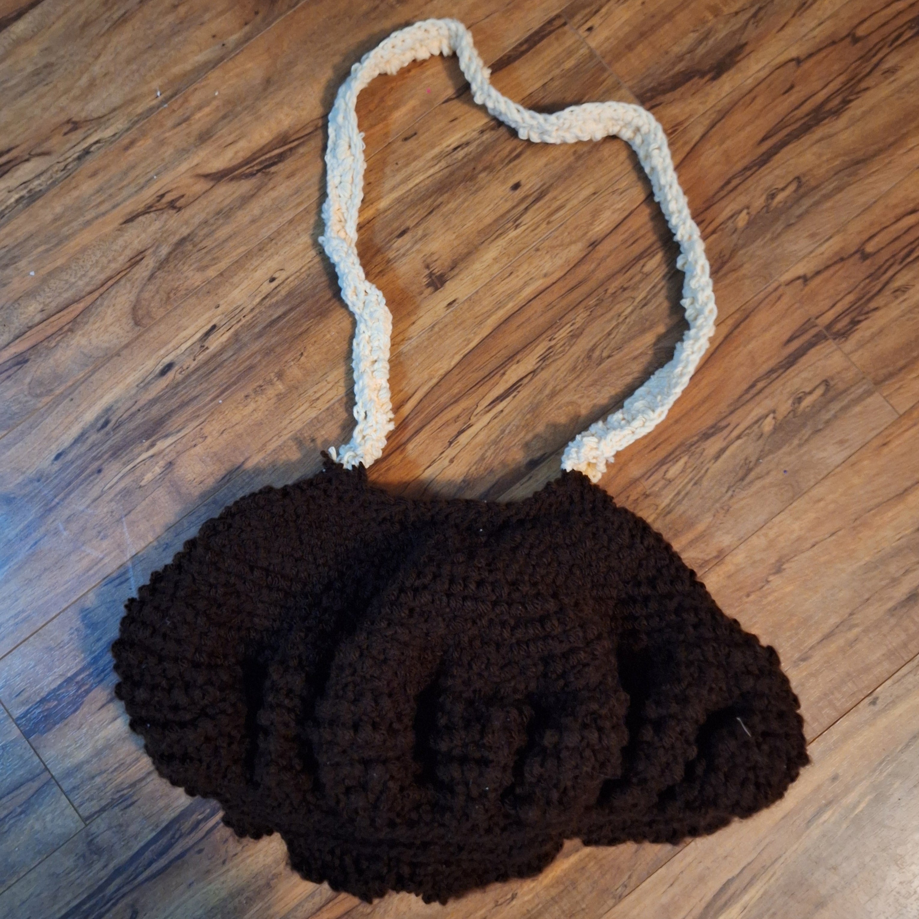 brown clamshell purse