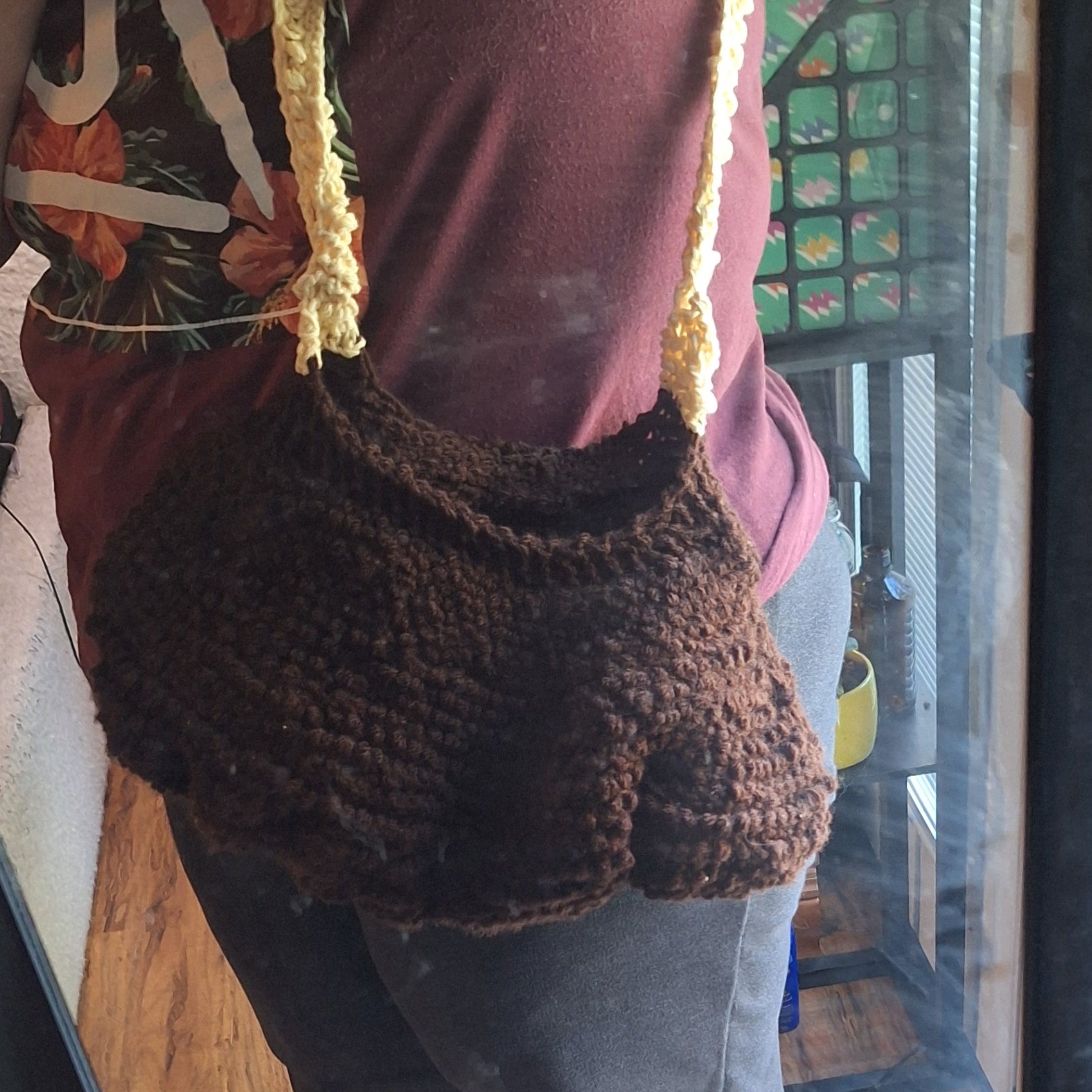 brown clamshell purse