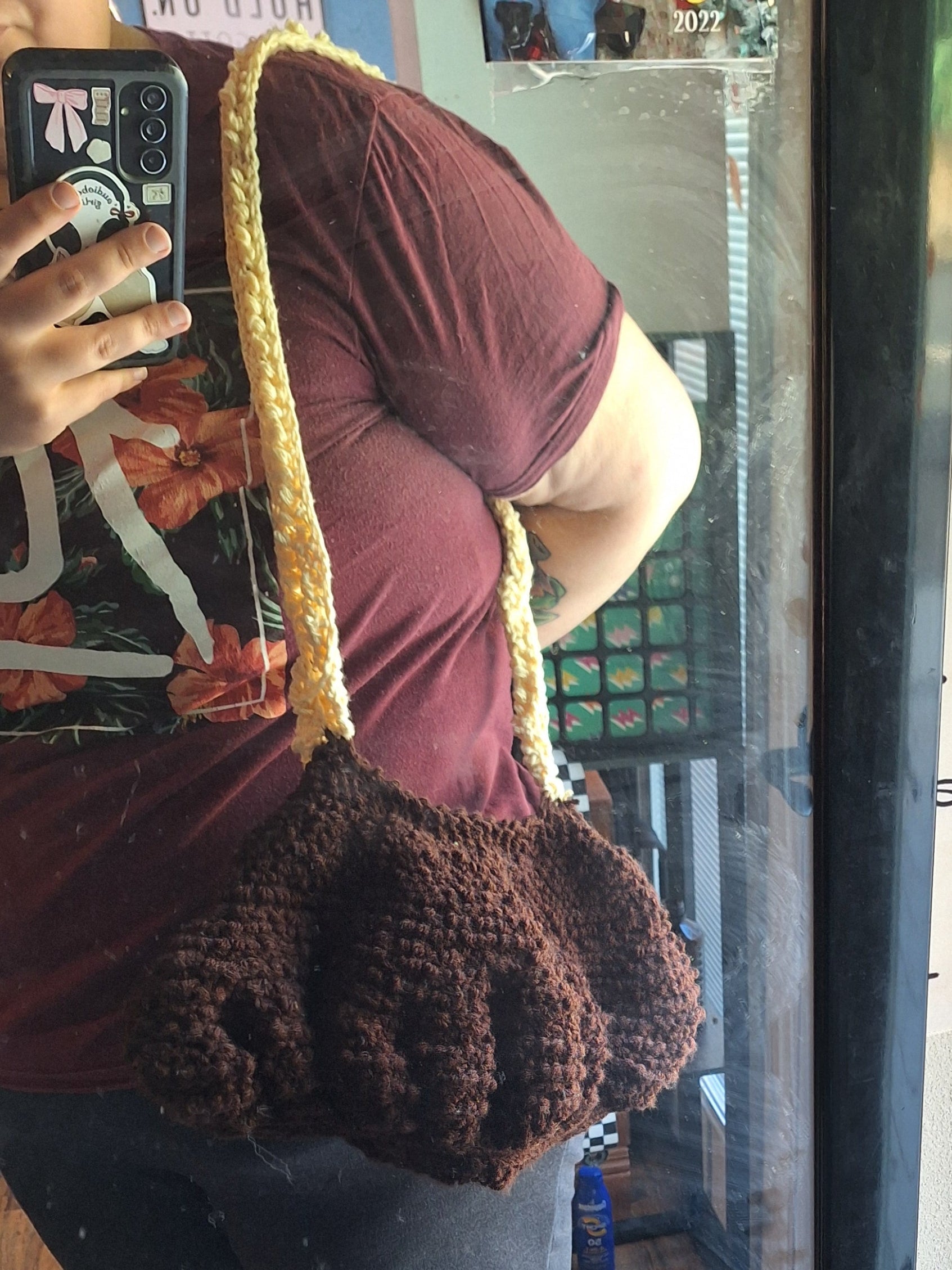 brown clamshell purse